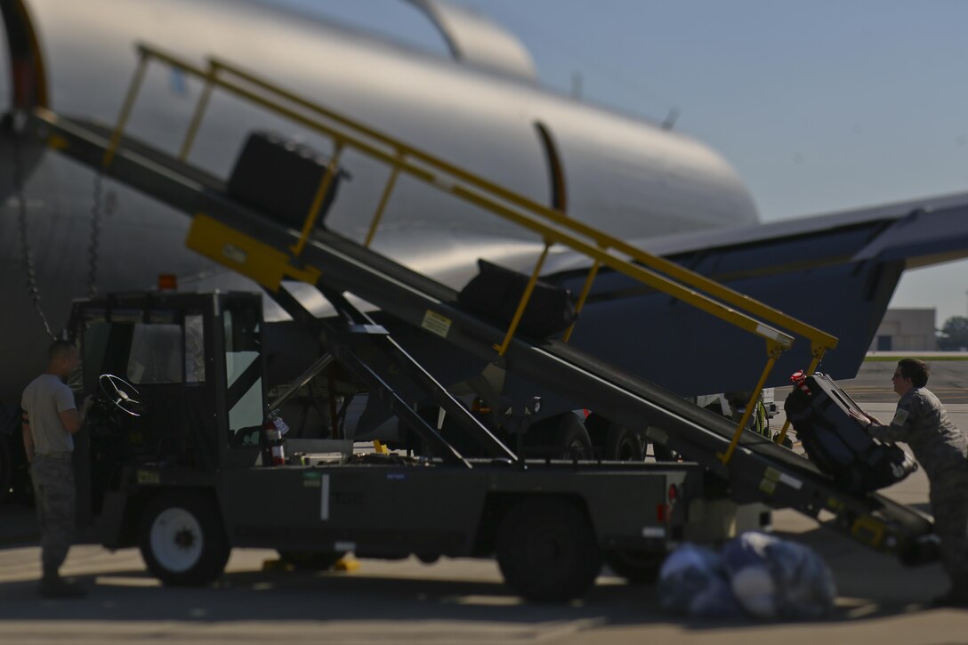 U.S. Air Force airmen from the 108th Wing load baggage onto a 108th Wing KC-135 Stratotanker at Joint Base McGuire-Dix-Lakehurst, N.J., Aug. 20, 2017. The 108th Wing is deploying aircraft and airmen to Andersen Air Force Base, Guam. (U.S. Air National Guard photo by Master Sgt. Matt Hecht/Released)