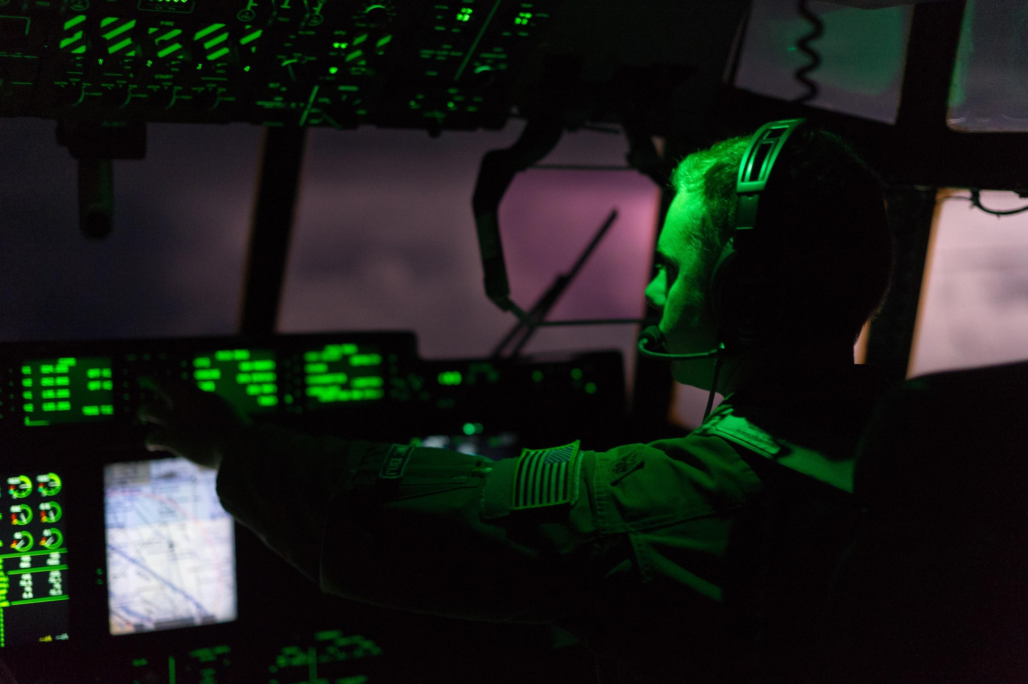 Air Force Reserve Maj. Lucas Caulder, pilot, 53rd Weather Reconnaissance Squadron, Keesler Air Force Base, Mississippi, pilots a WC-130J Super Hercules though clouds illuminated by lighting as they heads into a low-level pass though Hurricane Irma Sep. 8, 2017.