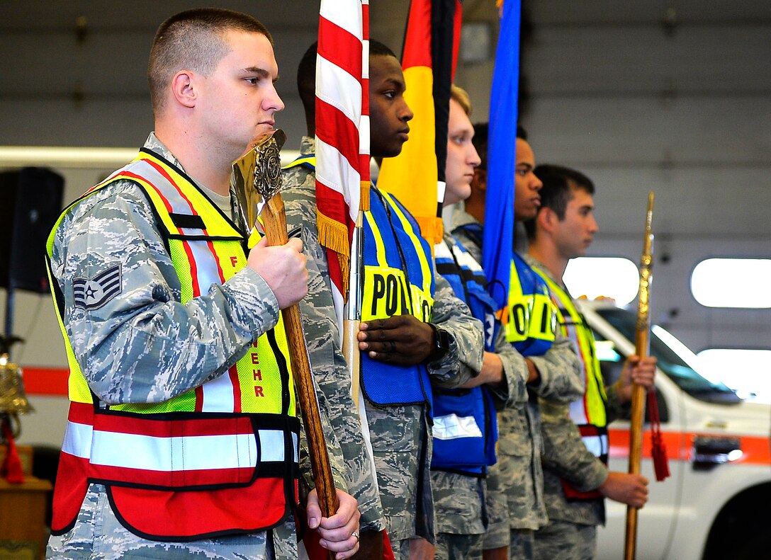 U.S. Airmen present the colors during a 9/11 retreat ceremony on Ramstein Air Base, Germany, Sept. 11, 2017. Kaiserslautern Military Community first responders conducted the ceremony to commemorate the 16th anniversary of the 9/11 attacks and to honor the first responders who lost their lives while conducting rescue operations during the event. (U.S. Air Force photo by Airman 1st Class Joshua Magbanua)