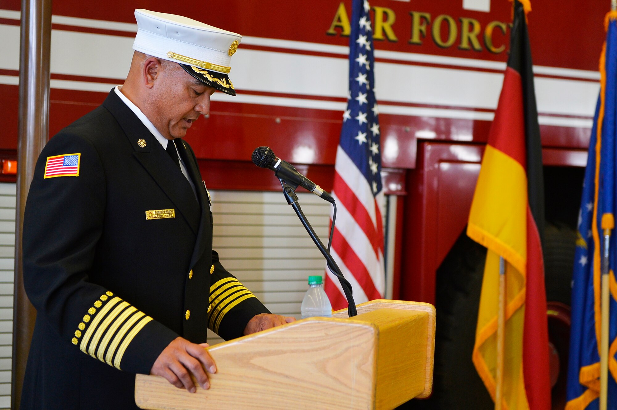 Anthony Rabonza, 86th Civil Engineer Squadron chief of fire emergency services, delivers remarks during a 9/11 retreat ceremony on Ramstein Air Base, Germany, Sept. 11, 2017. Members of the first responder community gathered to remember the 2,996 people who lost their lives in the attacks on the World Trade Center, the Pentagon, and the crash of United Airlines flight 93. (U.S. Air Force photo by Airman 1st Class Joshua Magbanua)