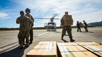 U.S. Marines with the 26th Marine Expeditionary Unit, deliver food and water by way of UH-1Y Venom helicopters to St. Thomas Cyril King E. Airport, U.S. Virgin Islands in order to aid victims of Hurricane Irma in the U.S. Virgin Islands, Sept. 10, 2017. The 26th MEU is supporting the lead federal agency in providing humanitarian relief efforts for Hurricane Irma.