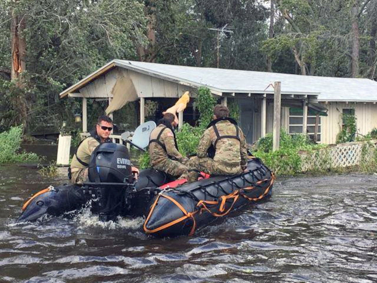 Guard searching flooded area in Fla.
