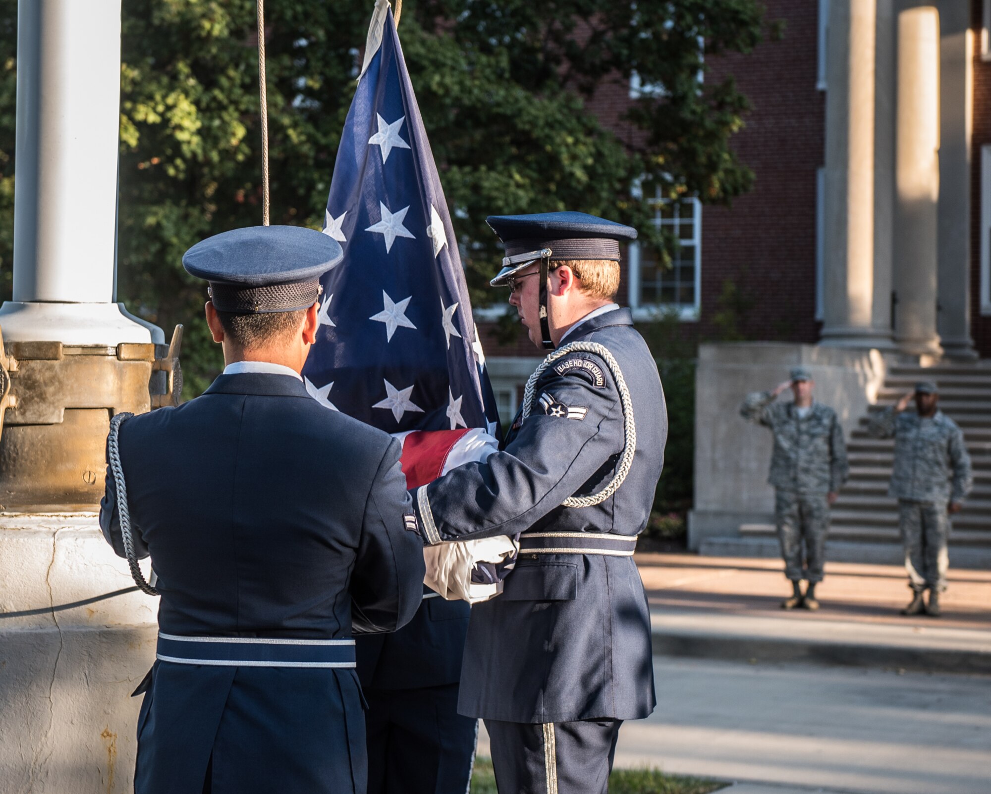 The 9/11 Reveille begins the work day, as service members remembered those affected by the 2001 terror attacks, Sept. 11, 2017, Scott Air Force Base, Ill. Scott remembered those affected by the terrorist attacks on Sept. 11 through a 9/11 reveille, a Belleville Memorial dedication, and a presentation by Chuck Rosenberg, former U.S. attorney of the Eastern District of Virginia. (U.S. Air Force photo by Cristopher Parr)