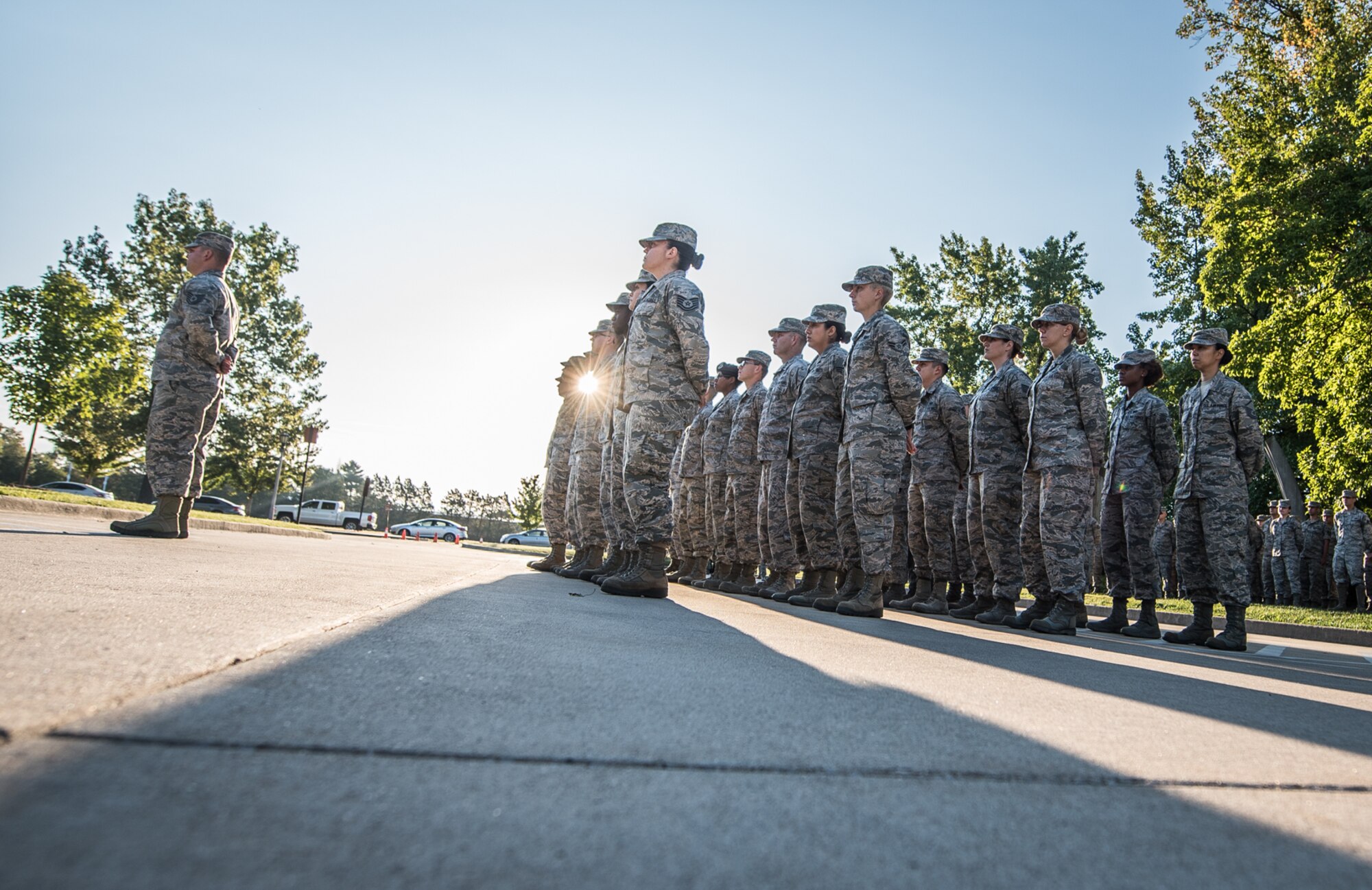 The 9/11 Reveille begins the work day, as service members remembered those affected by the 2001 terror attacks, Sept. 11, 2017, Scott Air Force Base, Ill. Scott remembered those affected by the terrorist attacks on Sept. 11 through a 9/11 reveille, a Belleville Memorial dedication, and a presentation by Chuck Rosenberg, former U.S. attorney of the Eastern District of Virginia. (U.S. Air Force photo by Cristopher Parr)