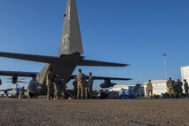 Members of the 563d Rescue Group wait to board an HC-130J Combat King II, Sept. 11, 2017, at Jackson-Medgar Wiley Evers Air National Guard Base, Miss. Aircraft and personnel from the 563d Rescue Group mobilized to Homestead ARB to assist in rescue efforts after Hurricane Irma made landfall. The 563d RQG is supporting FEMA’s disaster response efforts. (U.S. Air Force photo by Tech. Sgt. Zachary Wolf)
