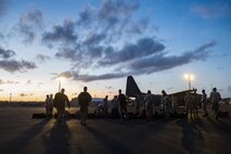 Members of the 563d Rescue Group unload cargo from an HC-130J Combat King II, Sept. 11, 2017, at Homestead Air Reserve Base, Fla. Aircraft and personnel from the 563d Rescue Group mobilized to Homestead ARB to assist in rescue efforts after Hurricane Irma made landfall. The 563d RQG is supporting FEMA’s disaster response efforts. (U.S. Air Force photo by Tech. Sgt. Zachary Wolf)