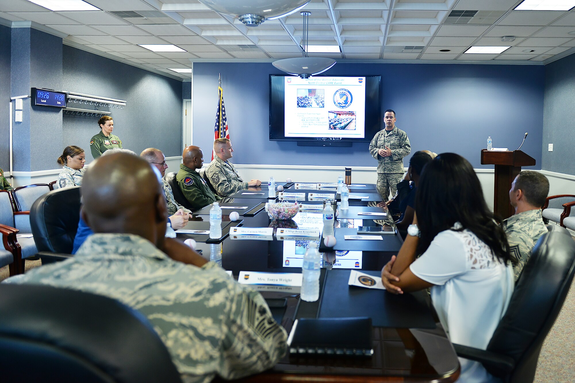 Maj. Michael Shick, 55th Wing warrior advocacy director, speaks to Chief Master Sgt. of the Air Force Kaleth O. Wright during a briefing held in the 55th Mission Support Group headquarters building on Offutt Air Force Base, Nebraska, Sept. 1, 2017.