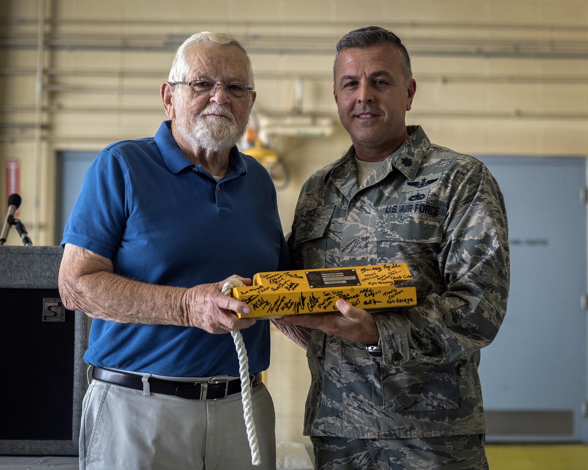 Retired U.S. Air Force Chief Master Sgt. Homer Wells, a former chief of maintenance with the 182nd Tactical Air Support Group, and Lt. Col. Steven Rice, the deputy commander of the 182nd Maintenance Group, pose for a photo during a ceremony honoring his service in Peoria, Ill., Aug. 24, 2017. Wells enlisted in 1947 and retired in 1984 with 37 years of service with the Illinois Air National Guard. (U.S. Air National Guard photo by Tech. Sgt. Lealan Buehrer)