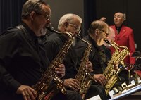 Members of the Smooth Sound Dance Band from Milford, Del., play music during the “Wings Over Dover,” 70th Anniversary Air Force Ball Sept. 8, 2017, at the Rollins Center, Dover Downs Hotel and Casino, Dover, Del. The band, part of the Milford Community Band, provided music for attendees to dance or listen to. (U.S. Air Force photo by Roland Balik)