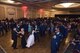 Attendees at the “Wings Over Dover,” 70th Anniversary Air Force Ball dance to the music played by The Smooth Sound Dance Band from Milford, Del., Sept. 8, 2017, at the Rollins Center, Dover Downs Hotel and Casino, Dover, Del. The band, part of the Milford Community Band, provided music for attendees to dance to. (U.S. Air Force photo by Roland Balik)