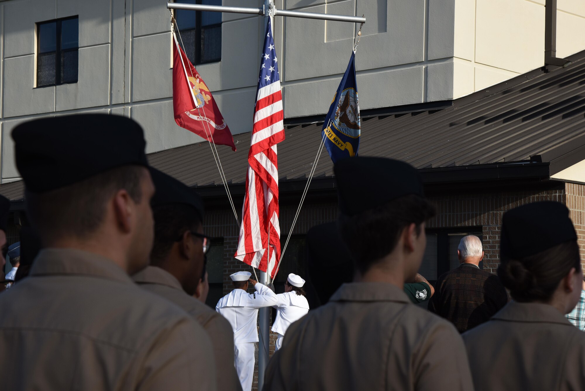 Members of the Center for Naval Aviation Technical Training Unit Keesler participate in a 9/11 memorial ceremony hosted by the CNATTU Keesler in front of Alho Manor Sept. 11, 2017, on Keesler Air Force Base, Mississippi. The event honored those who lost their lives during the 9/11 attacks. (U.S. Air Force photo by Kemberly Groue)
