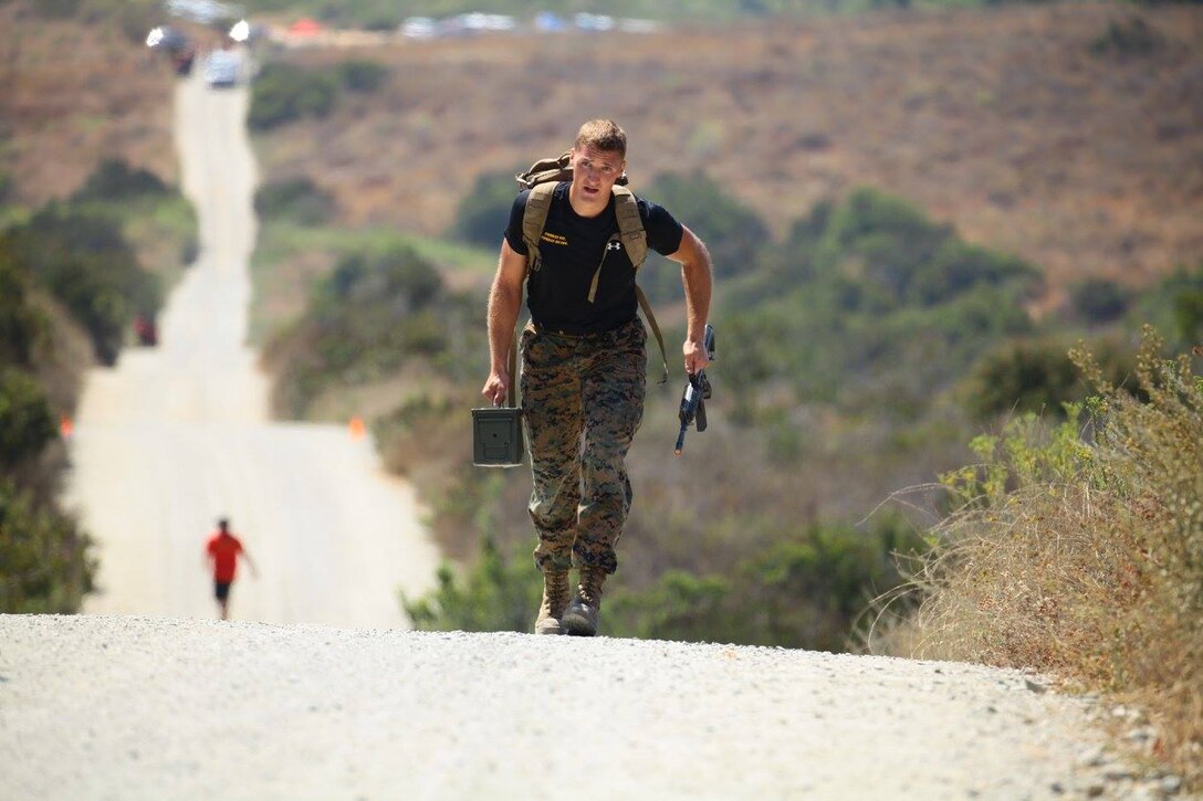 U.S. Marine Corps Sgt. Ethan Mawhinney, a Marine Air Ground Task Force planner with U.S. Marine Corps Forces, Special Operations Command, competes in an 880-meter Tactical Hill Climb during the Marine Corps third annual HITT Tactical Athlete Competition at Camp Pendleton, Calif., Aug. 28th through 31st, 2017.  Mawhinney won this year’s competition, successfully defending his title two years in a row as Male Division Champion at the 2017 competition. (Photo credit to MCCS Camp Pendleton)