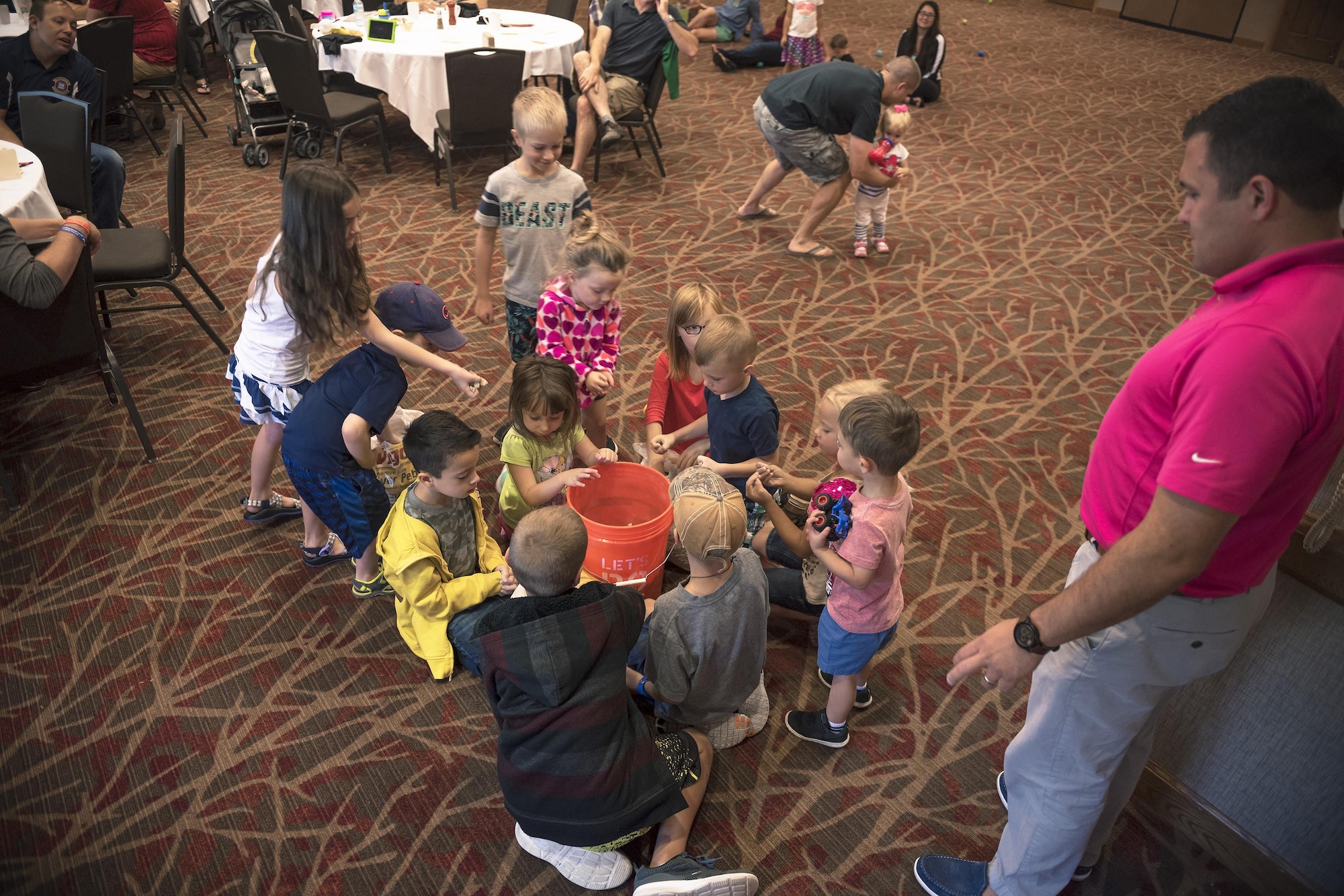 Children help U.S. Air Force Chaplain (Capt.) Jon Bormann, a chaplain with the 183rd Wing, Illinois Air National Guard, fill a bucket with rocks in an exercise illustrating how to prioritize family focuses in Lake Geneva, Wis., Aug. 25, 2017. Fourteen Illinois Air National Guard families participated in a chaplain-led Strong Bonds weekend retreat to learn how to strengthen family relationships through the “The 7 Habits of Highly Effective Families” curriculum. (U.S. Air National Guard photo by Tech. Sgt. Lealan Buehrer)