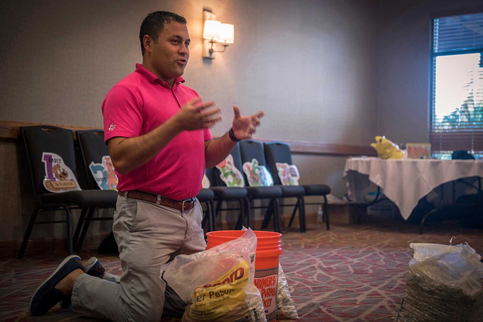 U.S. Air Force Chaplain (Capt.) Jon Bormann, a chaplain with the 183rd Wing, Illinois Air National Guard, uses a bucket and rocks to illustrate how to prioritize family focuses in Lake Geneva, Wis., Aug. 25, 2017. Fourteen Illinois Air National Guard families participated in a chaplain-led Strong Bonds weekend retreat to learn how to strengthen family relationships through the “The 7 Habits of Highly Effective Families” curriculum. (U.S. Air National Guard photo by Tech. Sgt. Lealan Buehrer)