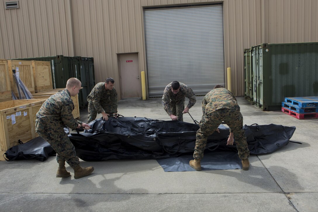 Marines with 3rd Force Reconnaissance Company prepare for relief efforts in the aftermath of Hurricane Irma