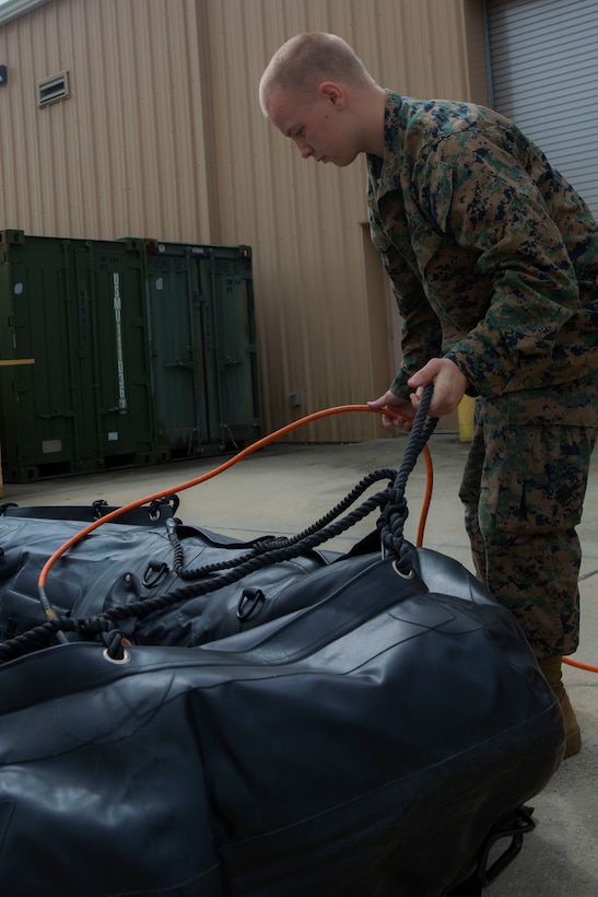 Marines with 3rd Force Reconnaissance Company prepare for relief efforts in the aftermath of Hurricane Irma