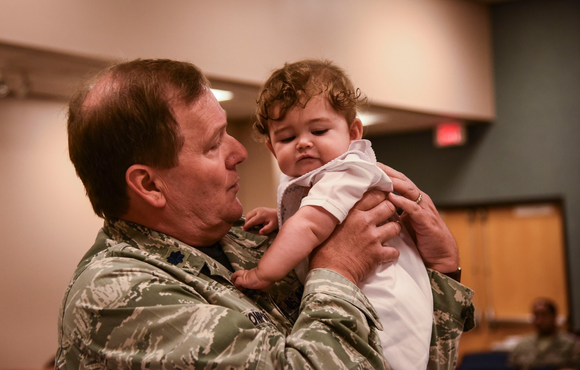 Chaplain (Lt. Col.) Pat Thompson, 403rd Wing, baptizes Caleb Benkoski, son of Capt. Brenda Gohr, 403rd Wing assistant staff judge advocate, and Maj. Aric Benkoski, 132nd Wing, Iowa Air National Guard, Sept. 10, 2017 at Keesler Air Force Base, Mississippi. “It was important to both my husband and I to have Caleb baptized just as a part of his church life and getting him exposed to that at a young age,” said Gohr. "We don’t have a home church yet back in Des Moines and I had gotten to know the Chaplain during drill weekend and doing it at the 403rd seemed like the right way.” (U.S. Air Force photo/Airman 1st Class Nathan Byrnes)