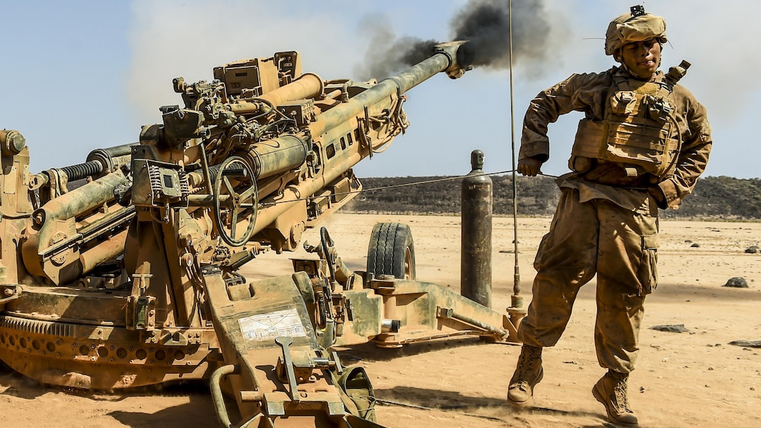 A Marine fires a howitzer during training in Africa.