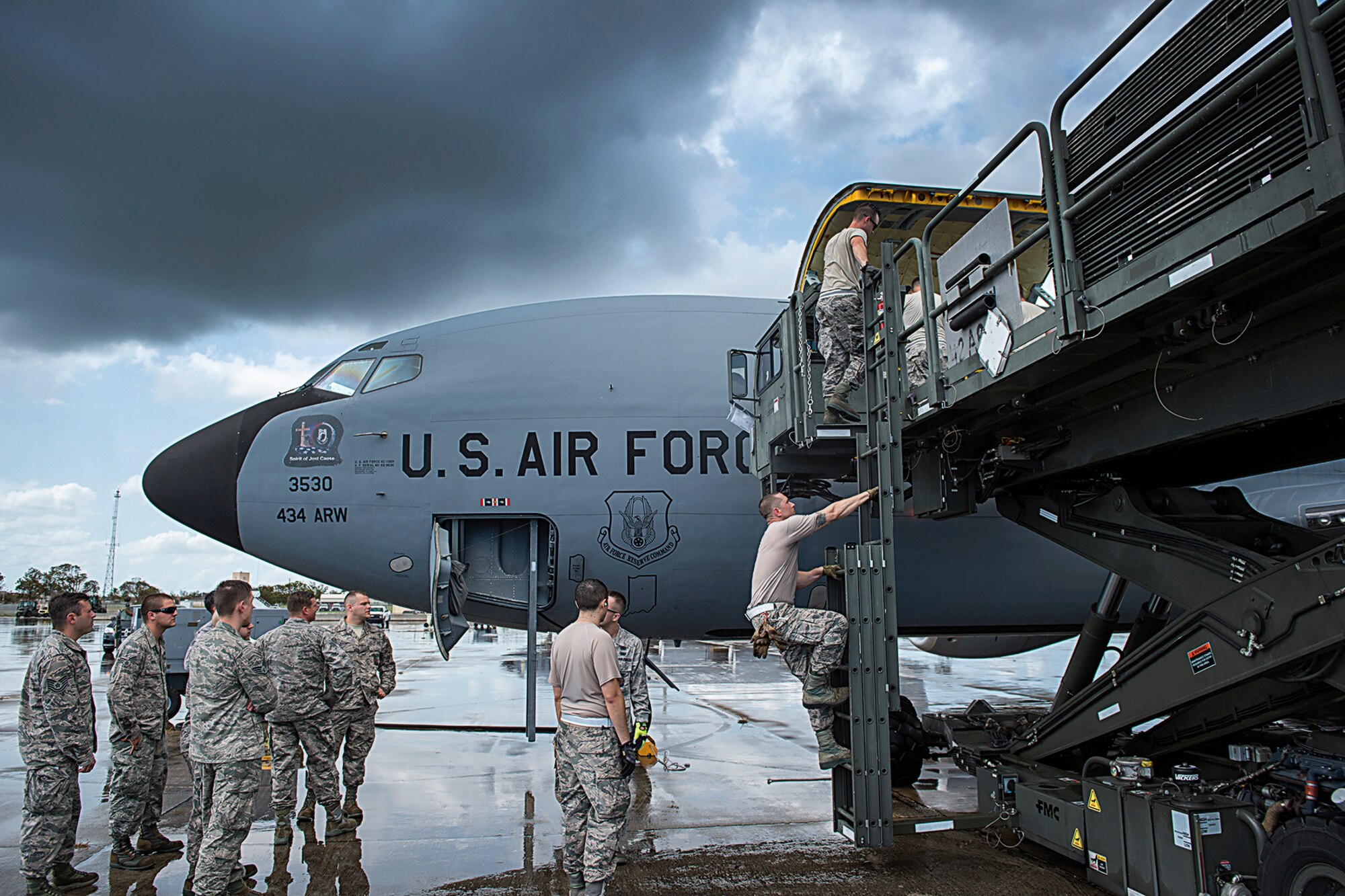 Firefighters from the 434th Air Refueling Wing unload their gear from a KC-135R Stratotanker at Homestead Air Reserve Base, Fla., Sept. 12, 2017. As soon as they were able to grab their gear the airfield could open to support heavy aircraft and further recovery efforts. (U.S. Air Force photo/Tech. Sgt. Benjamin Mota)