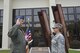Lt. Col. Brian Lukowski, Director, Space Forces, Continental Aerospace Defense Region-1st Air Force (Air Forces Northern), issues the reenlistment oath to Master Sgt. Jamie Jo Walker, U.S. Air Force Space Command training manager, in front of the 9-11 Memorial at the 601st Air Operations Center, Tyndall Air Force Base, Fla. Walker is deployed from Air Force Space Command Headquarters, Peterson Air Force Base, Colo., to help support contingency operations for Hurricanes Harvey and Irma. (Photo by Mary McHale)
