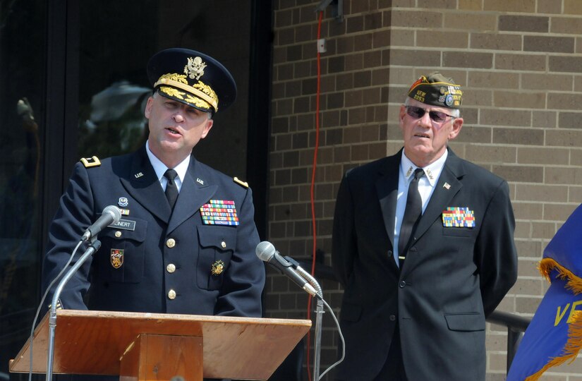 Major Gen. Patrick Reinert, the commanding general of the 88th Regional Support Command, speaks to the more than 200 people gathered at the Cherokee County, Iowa courthouse for a dedication ceremony for the Freedom Rock Tour that is in honor of the veterans of Cherokee County, September 10. Reinert is a native of Cherokee County, Iowa, and currently commands the 88th RSC, which provides base operations support for U.S. Army Reserve Soldiers, families and facilities across 19 states, of which Iowa is one.