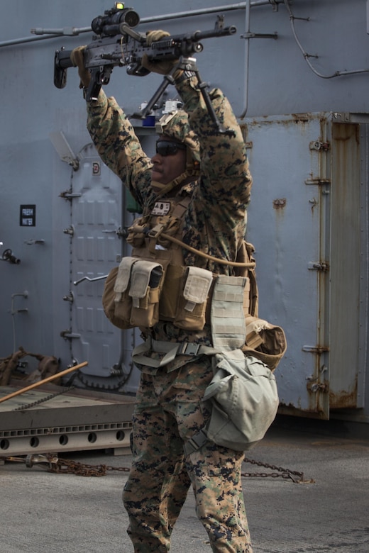 Lance Cpl. Phil Rand, a team leader with Kilo Company, Battalion Landing Team, 3rd Battalion, 5th Marines, 31st Marine Expeditionary Unit, conducts an exercise during combat conditioning marksmanship training aboard the USS Bonhomme Richard (LHD 6) while underway in the Pacific Ocean, June 24, 2017.