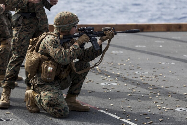 Lance Cpl. Joshua Lecleir, a rifleman with Kilo Company, Battalion Landing Team, 3rd Battalion, 5th Marines, 31st Marine Expeditionary Unit, fires an M16A4 service rifle during combat conditioning marksmanship training aboard the USS Bonhomme Richard (LHD 6) while underway in the Pacific Ocean, June 24, 2017.