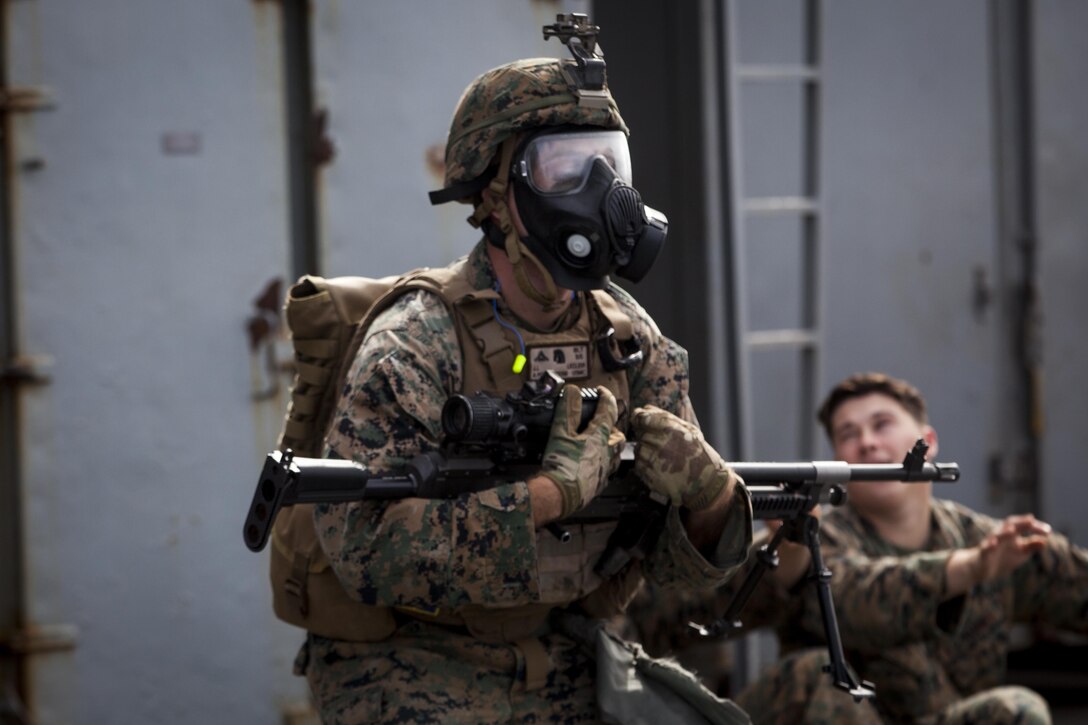 Lance Cpl. Joshua Leclier, a Rifleman with Kilo Company, Battalion Landing Team, 3rd Battalion, 5th Marines, 31st Marine Expeditionary Unit, conducts an exercise during combat conditioning marksmanship training aboard the USS Bonhomme Richard (LHD 6) while underway in the Pacific Ocean, June 24, 2017.