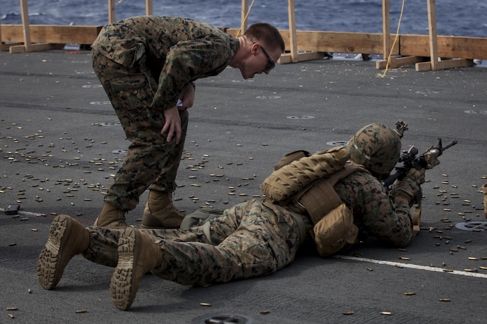 Lance Cpl. Joshua Leclier, a rifleman with Kilo Company, Battalion Landing Team, 3rd Battalion, 5th Marines, 31st Marine Expeditionary Unit, fires an M16A4 service rifle during combat conditioning marksmanship training aboard the USS Bonhomme Richard (LHD 6) while underway in the Pacific Ocean, June 24, 2017.