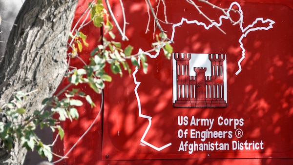 The U.S. Army Corps of Engineers’ Transatlantic Afghanistan District t-wall outside their headquarters at Bagram Air Field in Afghanistan, Sept. 11. (Photo by Catherine Lowrey)