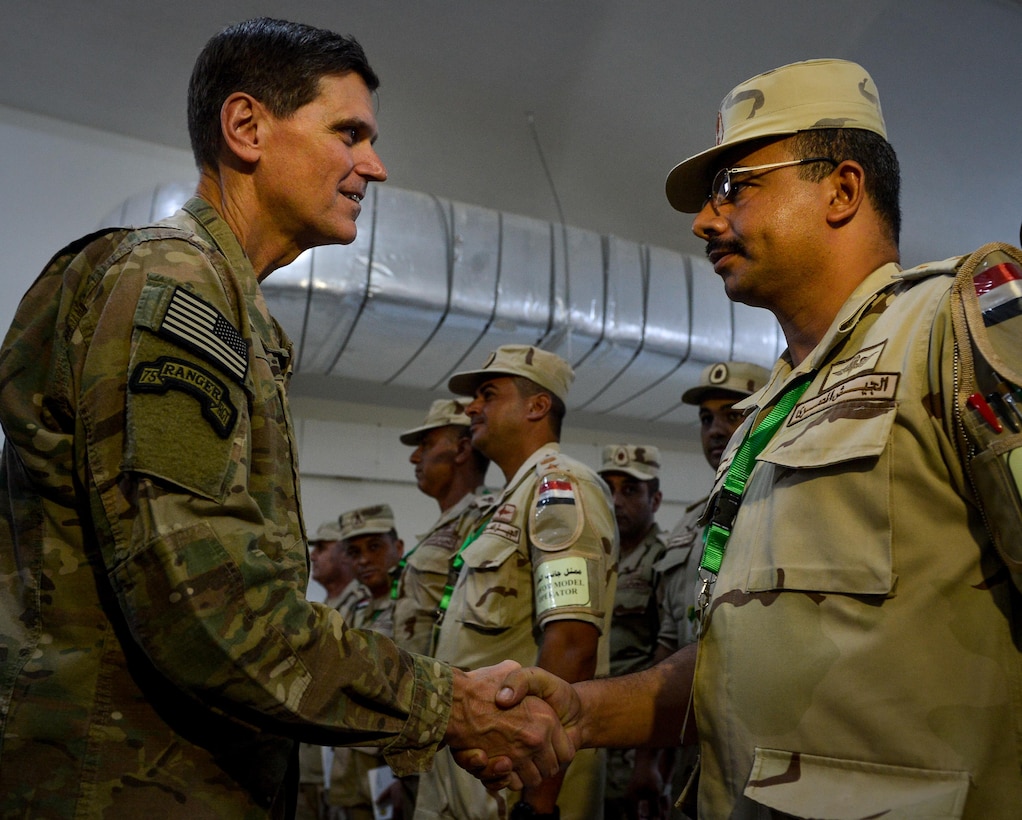 U.S. Army Gen. Joseph Votel, U.S. Central Command commander, shakes hands with an Egyptian soldier during Exercise Bright Star 2017 visit, Sept. 10, 2017, at Mohamed Naguib Military Base, Egypt. Bright Star was last held in 2009 with more than 15 countries and 15,000 participants. (U.S. Air Force photo by Staff Sgt. Michael Battles)