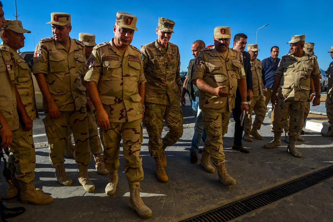 U.S. Army Gen. Joseph Votel, U.S. Central Command commander, walks with Egyptian military leadership during a visit to Exercise Bright Star 2017 visit, Sept. 10, 2017, at Mohamed Naguib Military Base, Egypt. During Bright Star 2017 service members from both countries will participate in a command-post exercise portion that consists of a scenario based on unconventional forces conducting operations against coalition forces. (U.S. Air Force photo by Staff Sgt. Michael Battles)