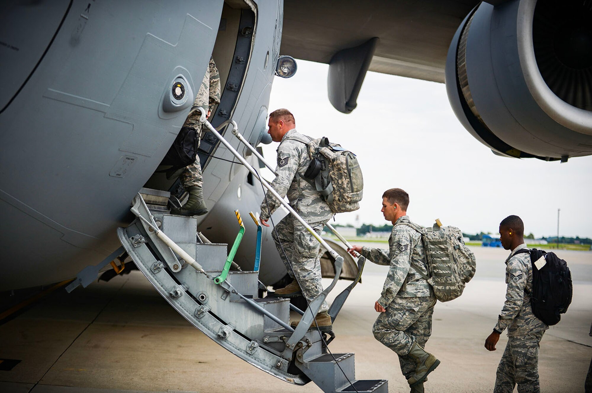 Reserve Citizen Airmen from the Air Force Reserve's 512th Airlift Wing, Dover Air Force Base, Del., board a C-17 Globemaster III aircraft for departure to Homestead Air Reserve Base, Fla., in support of the Hurricane Irma humanitarian relief efforts. More than 10 Dover reservists deployed in support of the Hurricane Irma humanitarian relief effort.  (U.S. Air Force photo by Senior Airman Damien Taylor)