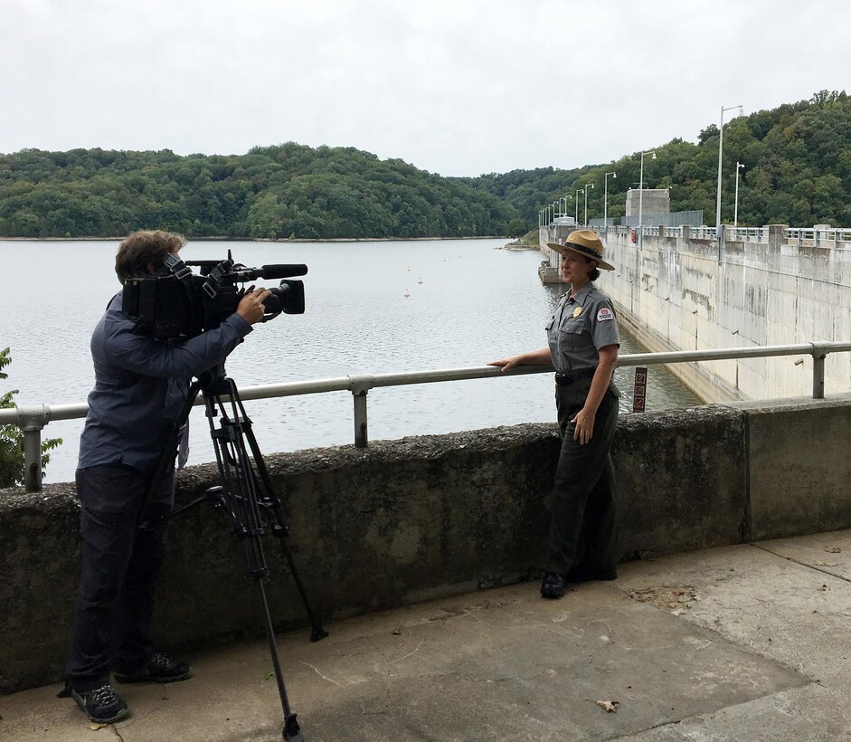 Paul Mojonnier, Tennessee Crossroads videographer, interviews Park Ranger Sondra Carmen Sept. 11, 2017 at Dale Hollow Dam in Celina, Tenn., for an upcoming episode in early 2018 for a feature as part of the dam’s 75th anniversary, also in 2018. The program airs on Nashville Public Television. (USACE photo by Steve Crawford)