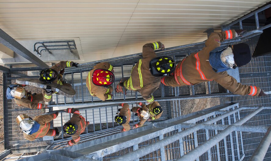 Firefighters with the 5th Civil Engineer Squadron hosted a 9/11 memorial climb in honor of those who lost their lives on 9/11. The firefighters climbed 110 flights of stairs representing each floor of the twin towers.