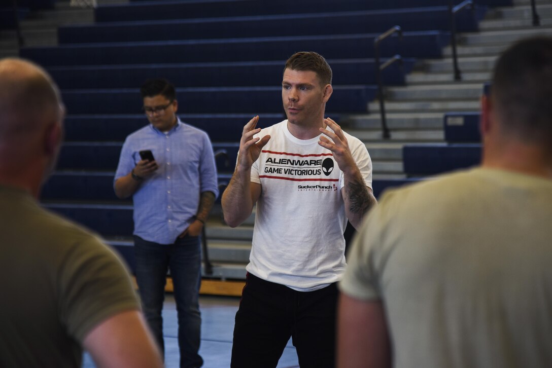 Paul Felder, Ultimate Fighting Championship lightweight division fighter, speaks to U.S. Army Soldiers about combative techniques at Joint Base Langley-Eustis, Va., Sep. 7, 2017.