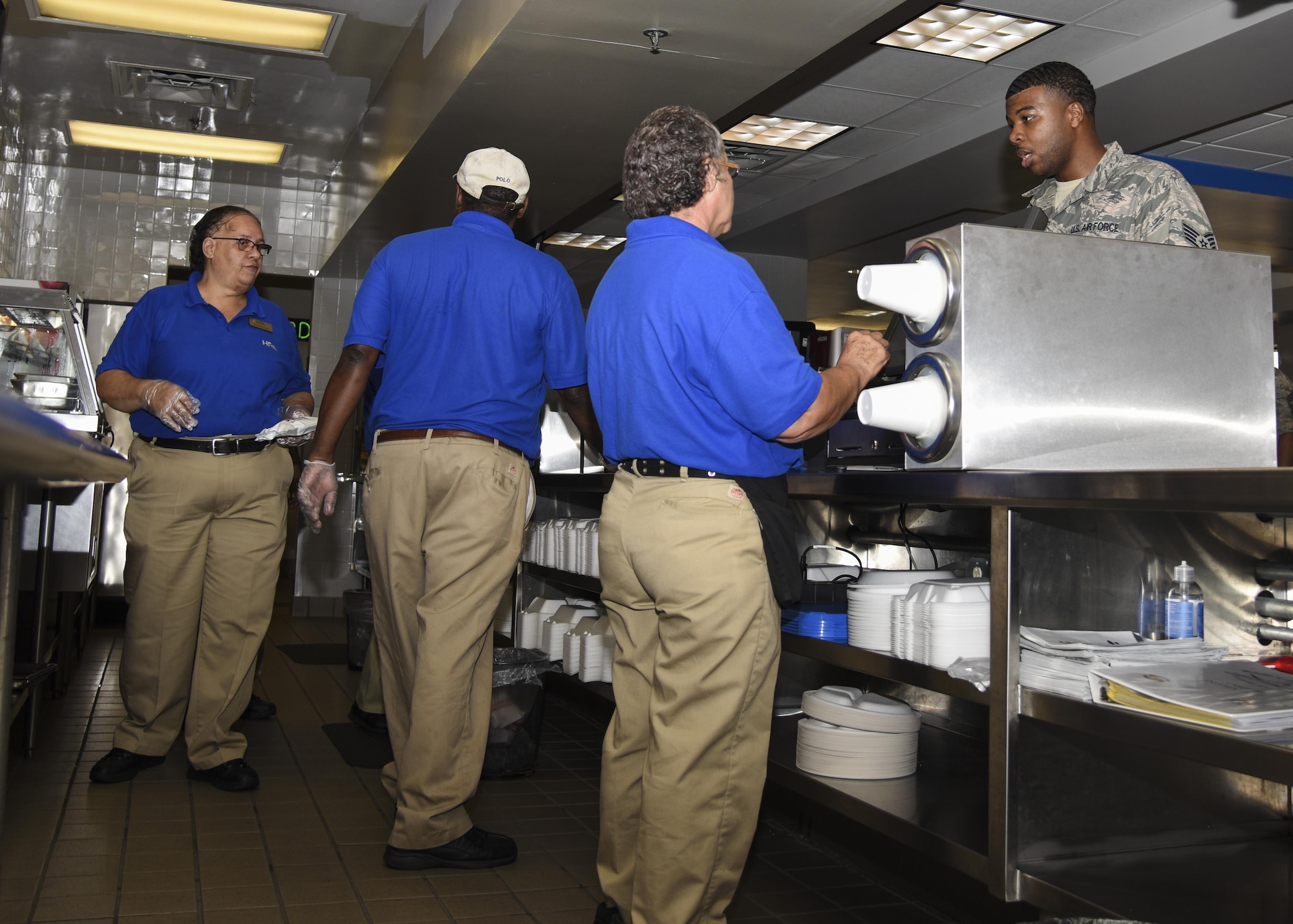 The Raptor Café personnel serve lunch at Joint Base Langley-Eustis, Va., Sept. 9, 2017.
