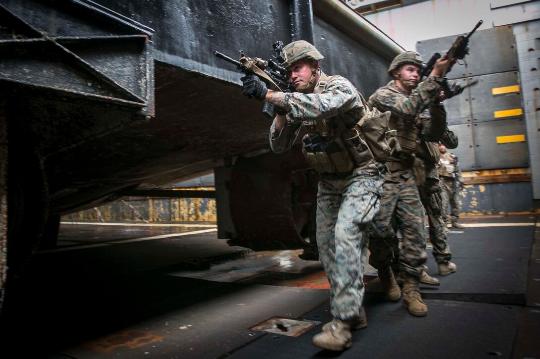 During AIT, Marines with Combat Logistics Battalion 31, the Logistics Combat Element for the 31st Marine Expeditionary Unit, and Marines with Battalion Landing Team, 3rd Battalion, 5th Marines, the Ground Combat Element for the 31st MEU, refined their abilities to provide security and life-sustaining support for possible HADR operations.