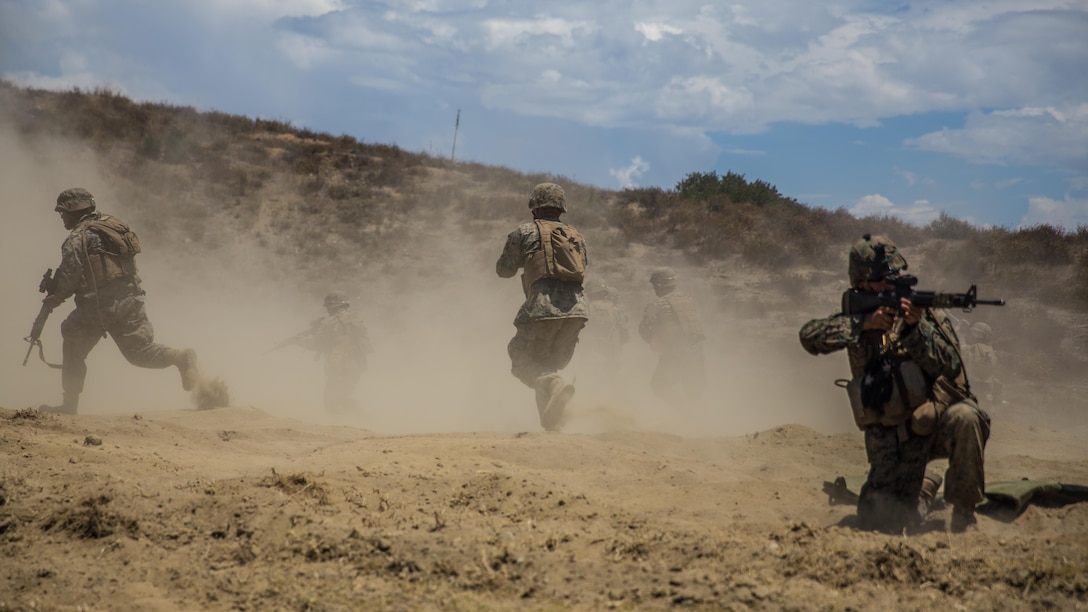Marines with Combat Service Support Company, I Marine Expeditionary Force Information Group, perform a simulated door breach at Camp Pendleton, Calif., Aug. 1, 2017. The Marines conducted the training to further develop their combat capabilities as part of the stand-up of the Marine Support Battalion. The mission of the new unit is to provide extensive logistical support to I MEF and I Marine Expeditionary Brigade command element, both in garrison and on deployment.