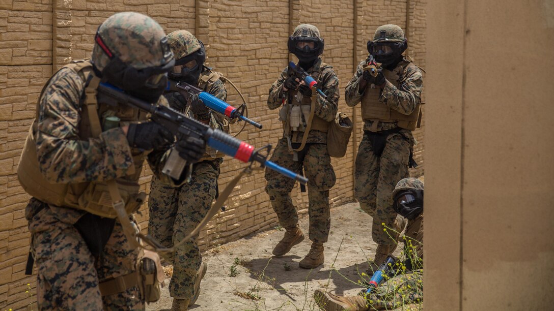 Marines with Combat Service Support Company, I Marine Expeditionary Force Information Group, conduct room clearing operations in a military operations in urban terrain town at Camp Pendleton, Calif. Aug. 1, 2017. The Marines conducted the training to further develop their combat capabilities as part of the stand-up of the Marine Support Battalion. The mission of the new unit is to provide extensive logistical support to I MEF and I Marine Expeditionary Brigade command element, both in garrison and on deployment.