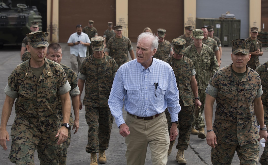 Secretary of the Navy Richard V. Spencer, center, walks with leaders from I Marine Expeditionary Force during his visit to 3rd Assault Amphibian Battalion at Marine Corps Base Camp Pendleton, Calif., August 30, 2017. Spencer also toured other I MEF units and met with I MEF leadership during his visit. (U.S Marine Corps photo by Lance Cpl. Justin E. Bowles)