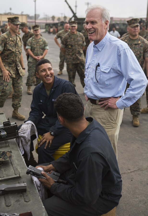 Secretary of the Navy Richard V. Spencer shares a laugh with Marines from 3rd Assault Amphibian Battalion during his visit to the unit at Marine Corps Base Camp Pendleton, Calif., August 30, 2017. Spencer also toured other I MEF units and met with I MEF leadership during his visit. (U.S Marine Corps photo by Lance Cpl. Justin E. Bowles)