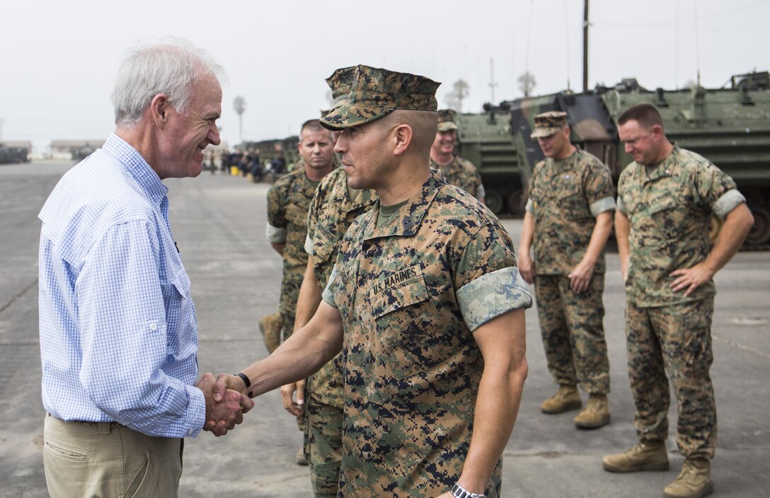 Secretary of the Navy Richard V. Spencer shakes hands with Sgt. Maj. Max Garcia, sergeant major of 3rd Assault Amphibian Battalion, 1st Marine Division at Marine Corps Base Camp Pendleton, Calif., August 30, 2017. Spencer also toured other I MEF units and met with I MEF leadership during his visit. (U.S Marine Corps photo by Lance Cpl. Justin E. Bowles)