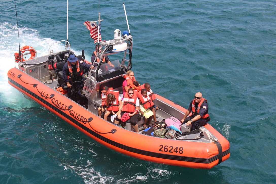 The Coast Guard Cutter Valiant crew transported more than 95 adults, kids and pets off St. Thomas to the cutter during Hurricane Irma response and relief efforts in the U.S. Virgin Islands, Tuesday, Sept. 12, 2017. The Coast Guard and it's partner agencies continuously work closely together to bring post-storm relief through maintaining a maritime presence, bring supplies and equipment ashore along with other emergency responders to assist the victims of Hurricane Irma in the U.S. Virgin Islands. U.S. Coast Guard photo