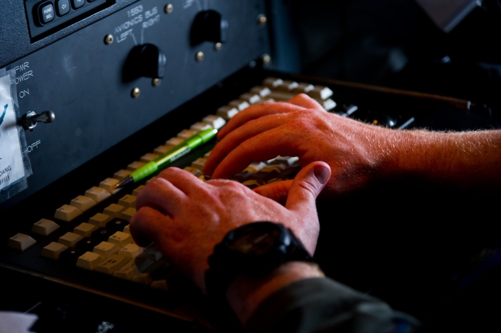 Air Force Reserve 1st Lt. James Carpenter, aerial reconnaissance weather officer, 53rd Weather Reconnaissance Squadron, Keesler Air Force Base, Mississippi, enters data into his workstation on a WC-130J Super Hercules during a mission fly through the eye of Hurricane Irma Sep. 10, 2017. The Air Force Reserve 53rd Weather Reconnaissance Squadron "Hurricane Hunters" fly WC-130J Super Hercules though the eye of active hurricanes to collect weather data using aircraft and externally dropped sensors to provide accurate weather data to the National Hurricane Center on approaching hurricanes. The Reserve Citizen Airmen provide 100 percent of the Air Force capability in low-level, real time data collection in Atlantic and Pacific Ocean tropical weather systems. (U.S. Air Force photo/Staff Sgt. Kyle Brasier)