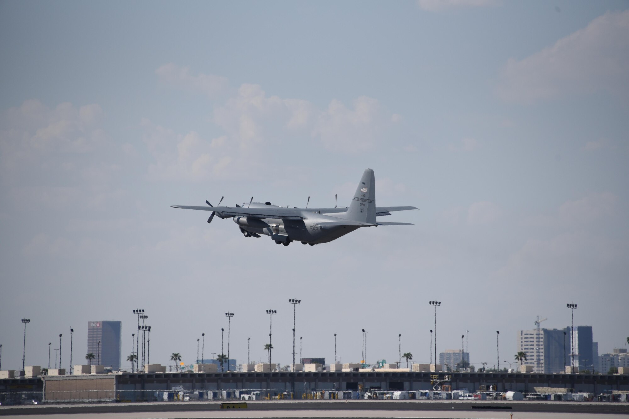 A C-130 Hercules aircraft assigned to the Missouri Air National Guard’s 139th Airlift Wing in St. Joseph, Missouri, takes off from Sky Harbor International Airport, Phoenix, Ariz., on Sept. 12, 2017. Airmen with the 161st Air Refueling Wing logistics readiness squadron, small air terminal, deployed to the U.S. Virgin Islands to provide support in response to the aftermath of Hurricane Irma on Sept. 12, 2017. (U.S. Air National Guard photo by Master Sgt. Kelly Deitloff)