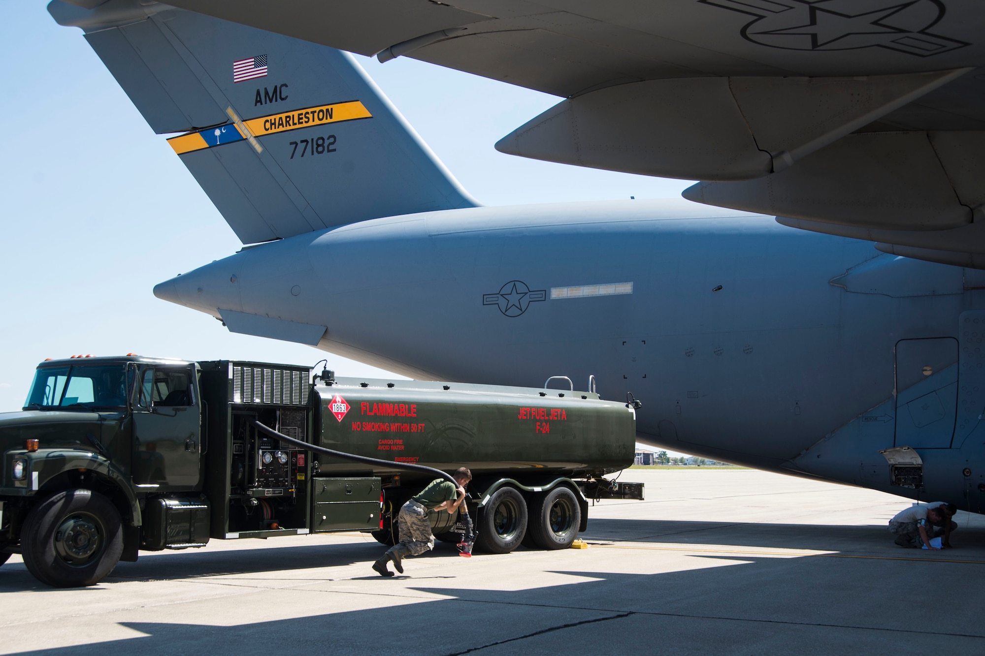 Scott Airmen refuel a C-17 Globemaster III from Joint Base Charleston, S.C. in preparation for Hurricane Irma, at Scott Air Force Base, Ill.