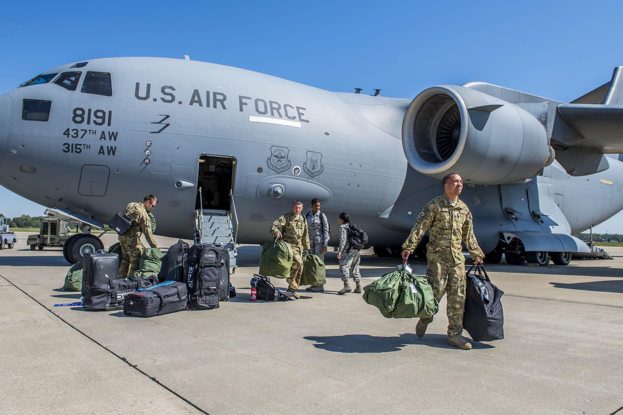 Airmen from Joint Base Charleston, South Carolina land at Scott Air Force Base, Illinois after evacuating in preparation for Hurricane Irma, Sept. 8, 2017.