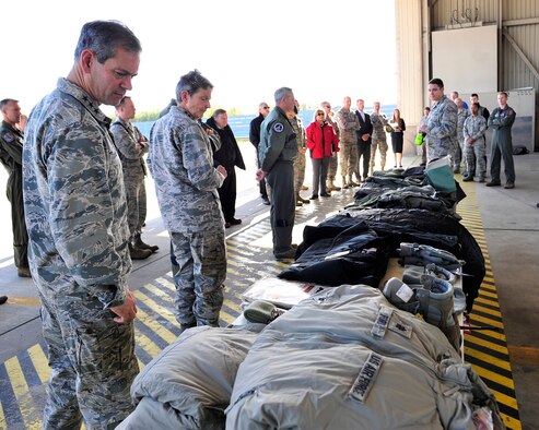 U.S. Air Force Lt. Gen. Kenneth Wilsbach, Alaskan Command commander, and U.S. Air Force Gen. Ellen Pawlikowski, Air Force Materiel Command commander, look at a cold weather gear display during an Arctic Security Expedition Sept. 8, 2017, at Eielson Air Force Base, Alaska. Air Force senior leaders from Headquarters Air Force and major commands visited Eielson AFB and other locations in Alaska to learn and discuss the challenges units face operating in the Arctic region and the affects climate change may have on their mission. (U.S. Air Force photo by Staff Sgt. Jerilyn Quintanilla)