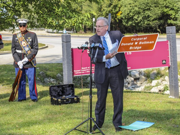 Illinois State Senator John G. Mulroe, the state senator of the Illinois’ 10th District, dedicates a bridge in Glenview, Illinois, Sept. 12, honoring a Marine Vietnam veteran. Town residents and city officials attended the bridge dedication ceremony honoring Cpl. Donald W. Bollman, a Purple Heart recipient who was killed in action in South Vietnam March 1, 1967. (U.S. Marine Corps photo by Lance Cpl. Quavaungh Pointer/Released)